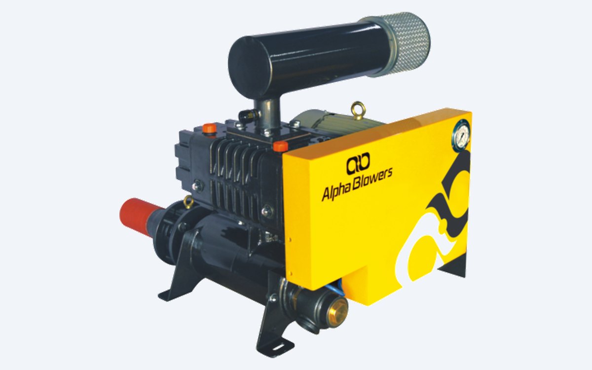 Alpha twin-lobe blower package used as a vacuum exhauster with acoustic hood and inlet silencer